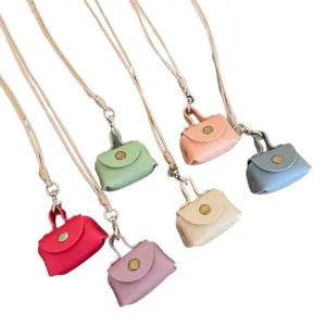 Colorful mini leather coin purse necklaces in multiple dopamine hues