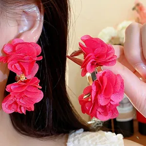 Stylish vibrant pink chiffon flower C-shaped hoop earrings for seaside vacation fashion