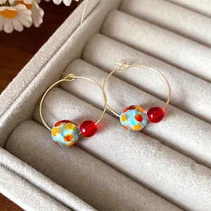 Fresh and sweet colorful resin bead hoop earrings featuring a minimalist summer design