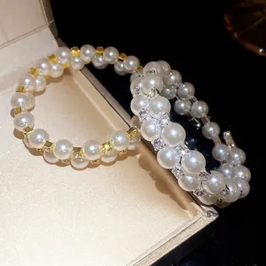 Double-layered pearl bracelet with rhinestones and gold accents, vintage French style