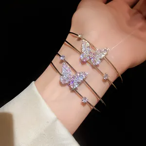 Close-up of elegant double-layer butterfly bangle with sparkling zirconia stone details