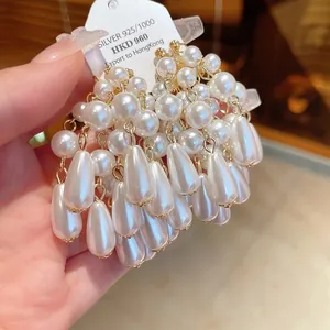 Elegant French style silver needle tassel earrings with cascading waterdrop pearls