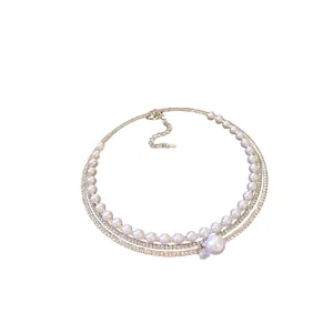 Multi-layer French style choker featuring artificial pearls and sparkling zircon stones