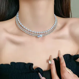 Detail of multi-layer French style choker with faux pearls and sparkling rhinestones