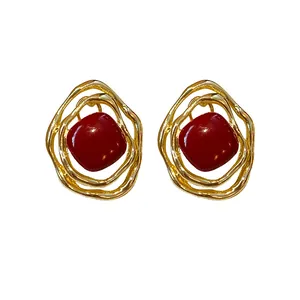 Elegant gold irregular nested metal ear clips with red oil drip enamel finish for women
