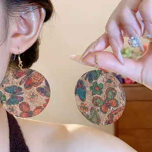 Vintage cork drop earrings with colorful butterfly and floral patterns for women