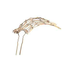 Elegant gold flower hair fork with articulated tassel and pearl accents for bun styling.