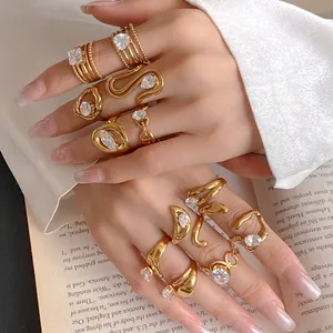 Close-up of elegant gold stainless steel rings with sparkling cubic zirconia details