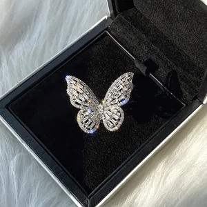 Detail shot of sparkling butterfly open ring with zircon stones in a jewelry box