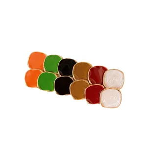 12-piece set of colorful enamel stud earrings with gold-plated trim and steel pins.