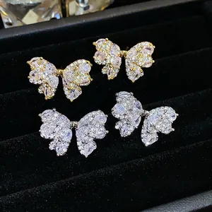 Elegant butterfly bow-knot stud earrings with sparkling zircons and silver needles