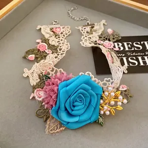 Elegant French style floral lace choker necklace featuring a large blue rose and pearls