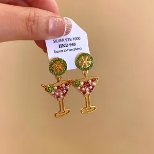Elegant martini glass drop earrings with lime slice detail, pearls and colorful rhinestones