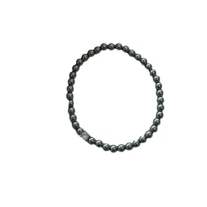 Élégant bracelet vintage en perles gris foncé avec breloque en zircon pour femme