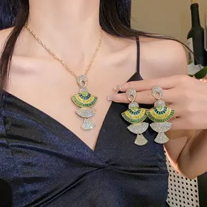 Exquisite fan-shaped crystal necklace and earrings set with green and yellow accents