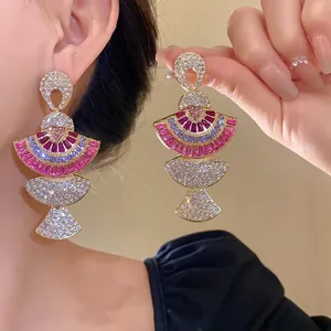 Vintage fan-shaped drop earrings with sparkling pink and purple crystals