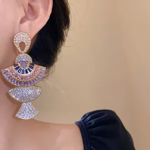 Detailed close-up showing the intricate crystal arrangement of vintage fan-shaped earrings