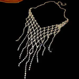 Stunning silver-toned rhinestone geometric tassel necklace with sparkling fringe detail.