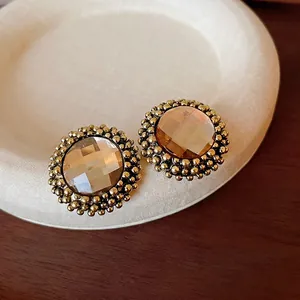 Vintage palace style round flower stud earrings with amber gemstone and gold beads