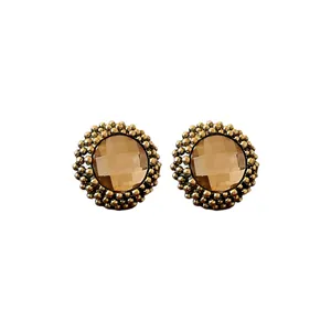Elegant vintage palace style round flower stud earrings with champagne crystal centers