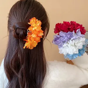 Elegant vibrant fabric flower hair stick and floral hair fork for bun hair styling