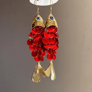 Red shell koi fish tassel drop earrings with golden accents for beach vacation