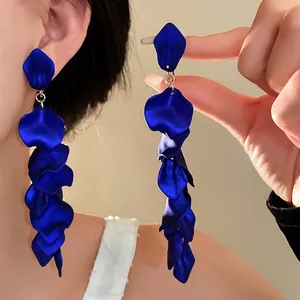 Exaggerated blue ruffled flower tassel drop earrings for a fashionable statement look