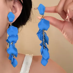 Elegant long blue petal tassel earrings featuring matte finish displayed on a model