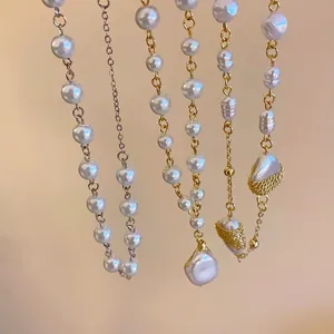 French luxury irregular pearl necklaces with gold and silver chains for an elegant look