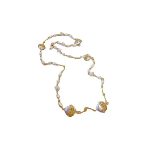 Elegant French style long irregular pearl necklace sweater chain with golden accents