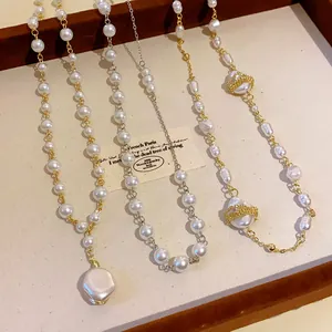 Detailed view of elegant French style irregular pearl necklaces on a display tray