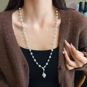 Elegant French style long gold chain necklace with irregular baroque pearl pendant