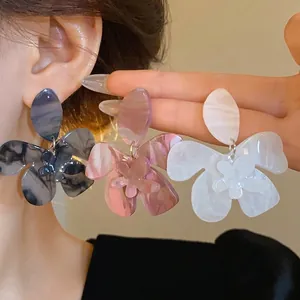 Large elegant marbled resin flower earrings for women available in three stylish colors