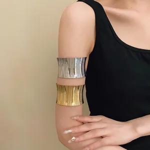 Elegant minimalist metal open cuff armbands with polished gold and silver finishes