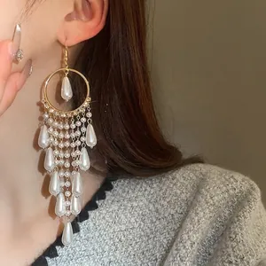 Elegant long tassel earrings with teardrop pearls and zircon, gold finish palace style