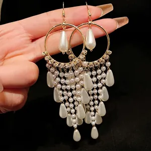 Elegant French vintage gold tassel earrings with zircon and drop pearls