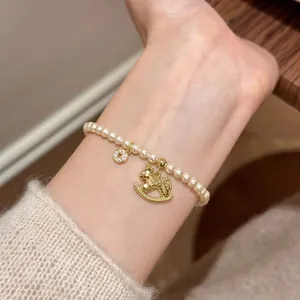 Retro Elegantes Künstliche Perlenarmband Mit Vergoldetem Schaukelpferd Anhänger Und Zirkon Rundanhänger Schmuck Für Damen