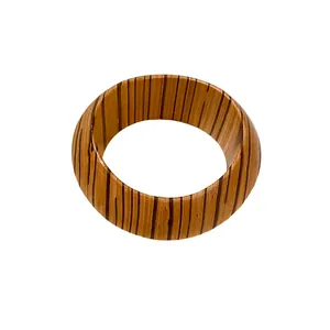 Handmade wooden bangle bracelet with natural striped grain texture in vintage style