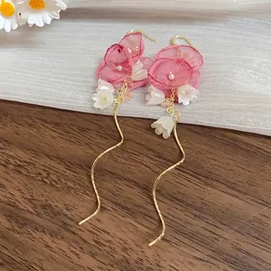 Elegant pink chiffon flower tassel drop earrings with white bell charms and faux pearls