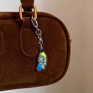 Cute Banana Cat acrylic keychain with funny meme cat design for backpack charms