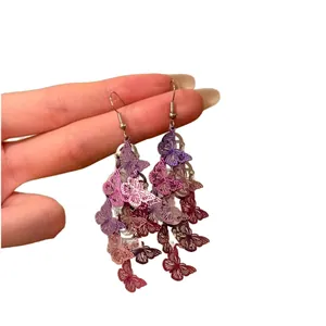 Stunning vintage hollow butterfly tassel drop earrings with purple gradient design