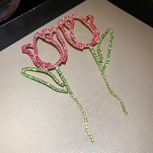 Elegant tulip flower drop earrings featuring sparkling pink and green rhinestones and silver needles