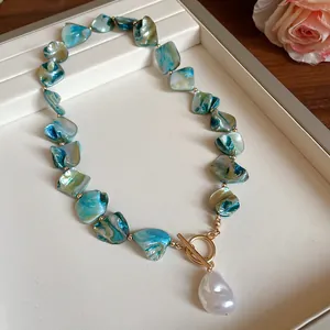 Bohemian blue shell beaded necklace with gold OT clasp and Baroque pearl pendant