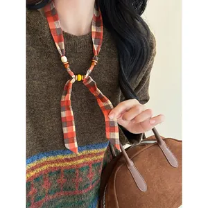Bohemian ethnic style fabric necklace featuring chiffon plaid pattern with wood and ceramic beads