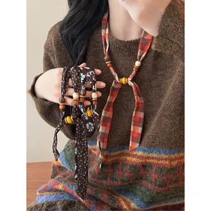 Bohemian fabric chiffon necklace with wood and ceramic beads in vintage ethnic style