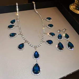 Elegant vintage dark blue teardrop gemstone jewelry set with necklace and earrings
