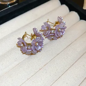Elegant purple resin flower hoop earrings with pearl and crystal accents for women