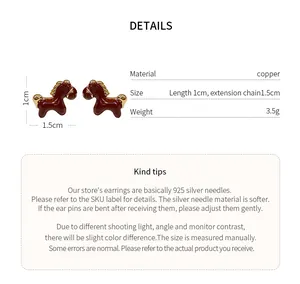 Detail view of brown enamel horse stud earrings with size and material specifications