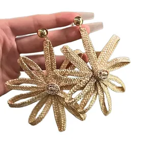 Natural raffia woven flower drop earrings in bohemian style for summer beach vacations
