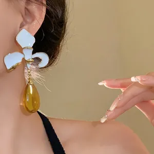 Elegant white enamel flower earrings with amber waterdrop pendant in vintage palace style